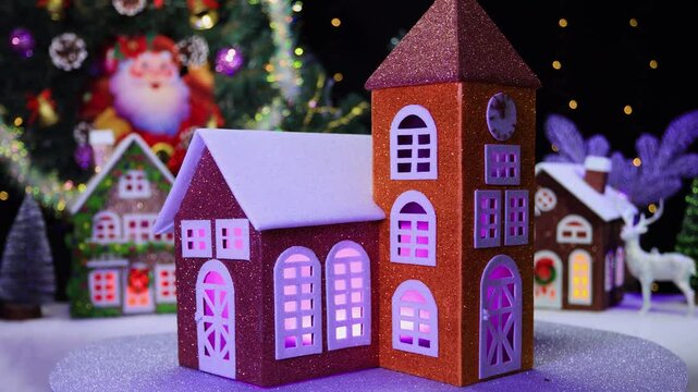 Against the background of Christmas trees with blinking garlands of an Advent wreath and houses with a typewriter, the chapel rotates