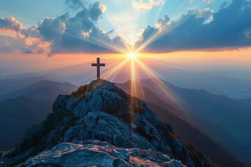 A cross on top of a mountain in the rays of the sun, representing the power of faith and spirituality.