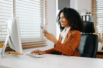  Businesswoman Analyzing Finance on Tablet and Laptop at modern Office Desk tax
