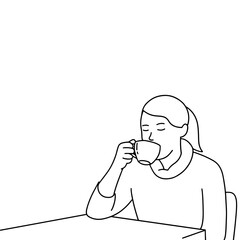 Young woman drinking coffee in cafe