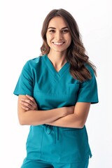 Happy woman in teal scrubs smiling with crossed arms. Perfect for medical, healthcare, and nursing themes.