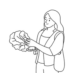 Women holding fresh vegetable