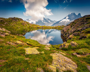 Wonderful summer view of Lac Blanc lake with Mont Blanc peak on background, Chamonix location....
