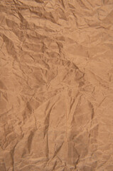 Brown crumpled paper background vignette