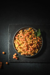 white currant on a black plate