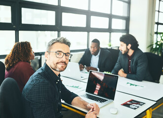 Office, glasses and portrait of man, laptop and review of paperwork in meeting and project. Screen,...