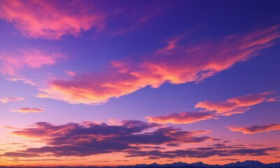 Fototapeta premium Pink and purple clouds fill the sky at sunset