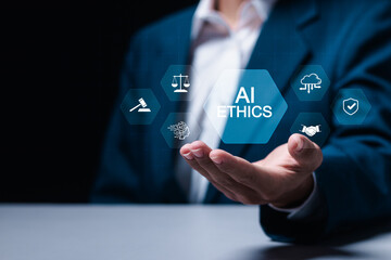 AI ethics or AI law concept. Businessman with ai ethics icon on virtual screen for compliance, regulation, standard , business policy and responsibility.