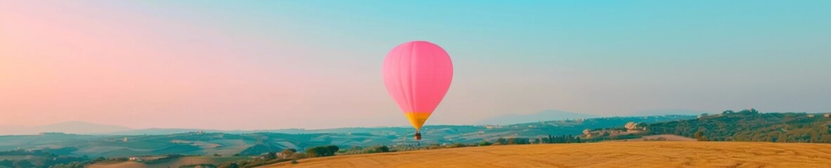 Fototapeta premium Dreamy Sunrise Adventure Hot Air Balloon Floating Above a Serene Landscape, Embodying Aspirations and Minimalism
