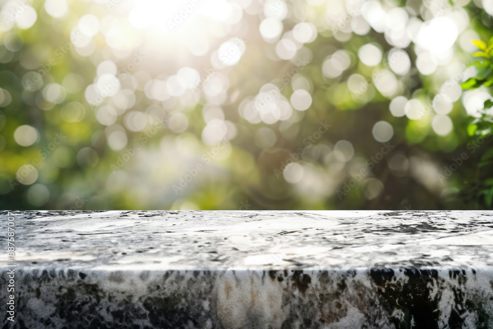 Poster empty stone table top on blurred green garden background providing a mockup space for product displa