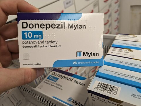 Prague, Czech Republic - July 10 2024: DONEPEZIL MYLAN box of medication with DONEPEZIL active substance by MYLAN, used for treatment of Alzheimer's disease and dementia.

