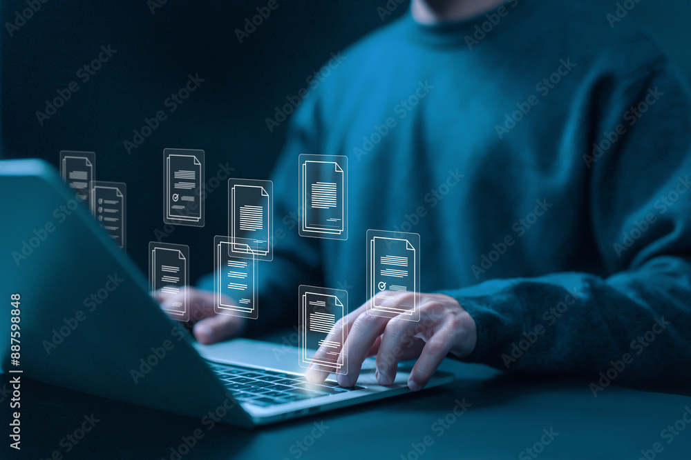 Aufkleber manages document data on a laptop. concept of document files digital electronic, business paperless.