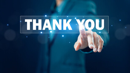 businessman showing the message thank you on a display screen. concept of thank you business,...