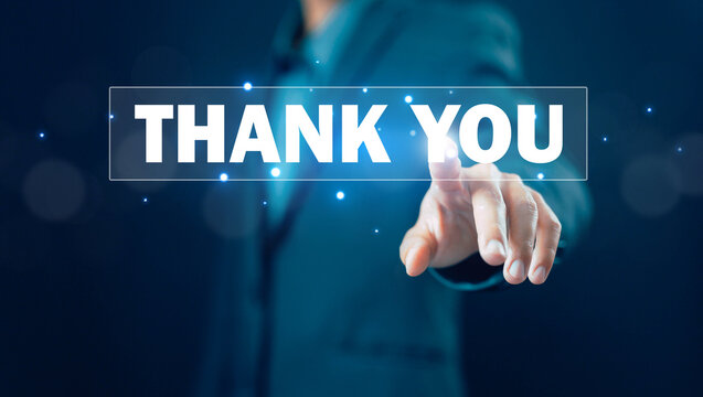 businessman showing the message thank you on a display screen. concept of thank you business, appreciation and gratitude, congratulations, presentation from technology digital