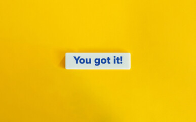 You Got It Phrase. Blue Text on Letter Tile on Yellow Background. Minimal Aesthetic.