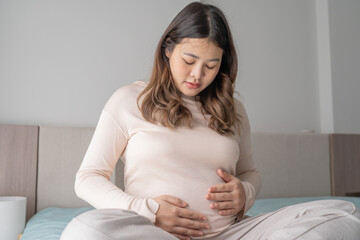 worried pregnant woman concerned and anxious woman in pregnancy overthinking worrying...