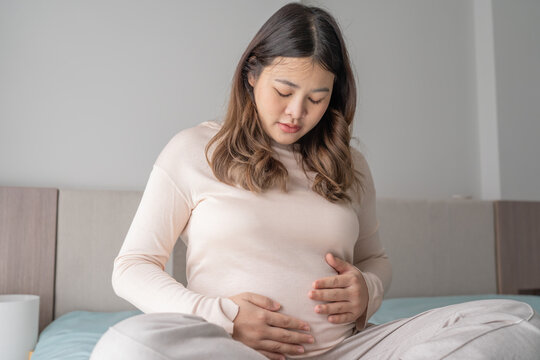 worried pregnant woman concerned and anxious woman in pregnancy overthinking worrying about pregnancy problem Pregnancy depression Mental health