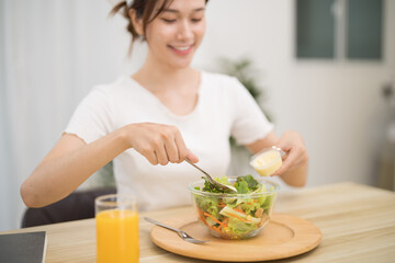 Asian woman dieting Weight loss eating fresh fresh homemade salad healthy eating concept
