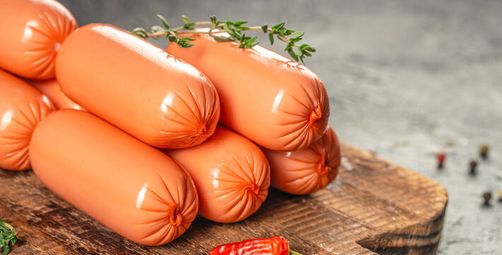 Tasty boiled sausages poultry meat chicken or turkey. copy space