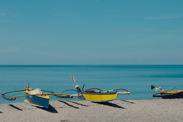 Fishing boats docked at Philippine beach shore