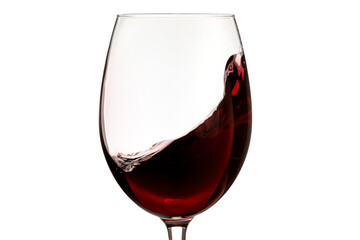 Glass of red wine with the wine forming a wave