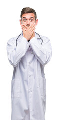 Young handsome doctor man over isolated background shocked covering mouth with hands for mistake. Secret concept.