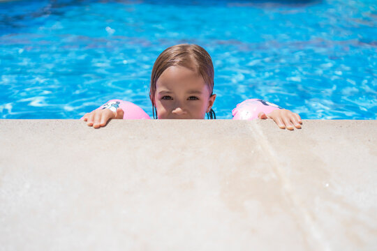 portrait of a girl in the pool