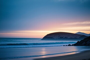 Seascape of golden sunset over the ocean, with clouds reflecting on the water