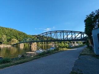 Fototapeta premium Davle town on confluence of rivers Vltava and Sazava, local small port and a bridge over Vltava river,Bohemia,Czech republic,Europe