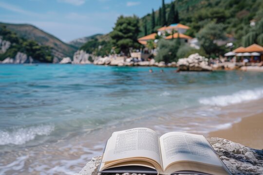 Open book on the beach with a beautiful seascape in the background - Powered by Adobe