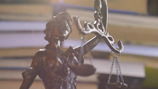 Scales of Lady Justice. Femida and law concept. International Court of Justice. Books in liberty background