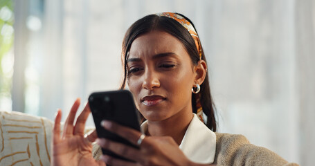 Cellphone, confused and indian woman online, reading and bad news article on social media. Doubt,...
