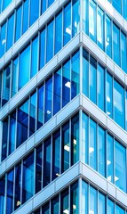 Obraz premium Abstract modern glass office building in downtown, view from below