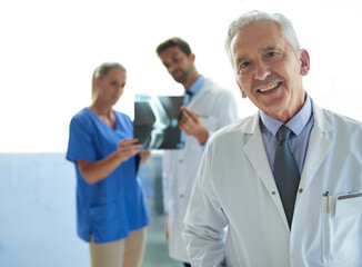 Portrait, doctor or mature man with leadership in cancer, osteoporosis or arthritis research in...