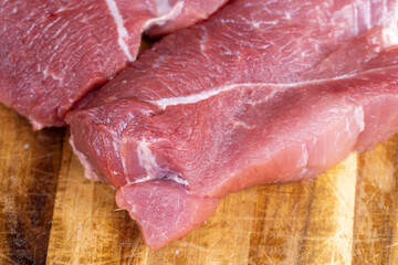 a piece of raw pork before cooking