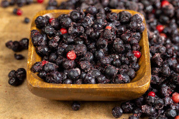 various blueberries after freezing are on the table