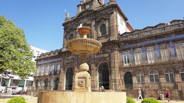 Fountain about Church of Trinity, is church in city of Porto in Portugal