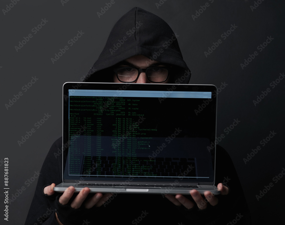 Poster man, hoodie and hacker in studio, laptop and fraud of cybersecurity, online and glasses with screen.