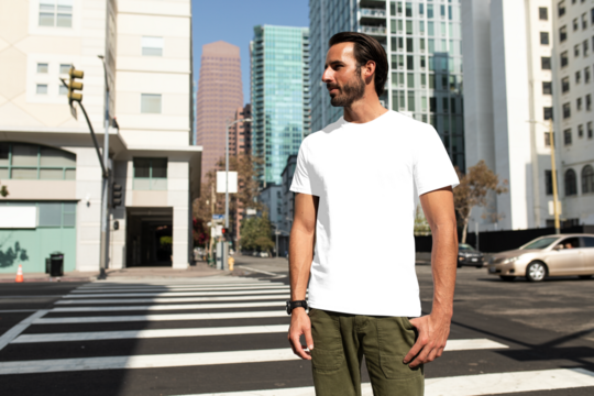 Png men’s tee apparel mockup on a man at the crosswalk street style fashion