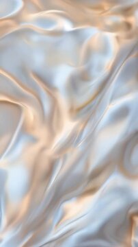 Luxurious flowing nacre silk fabric in slow motion for elegant backgrounds and commercial use