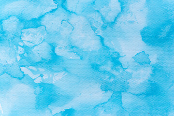 Obraz premium 青色の水彩絵の具の背景