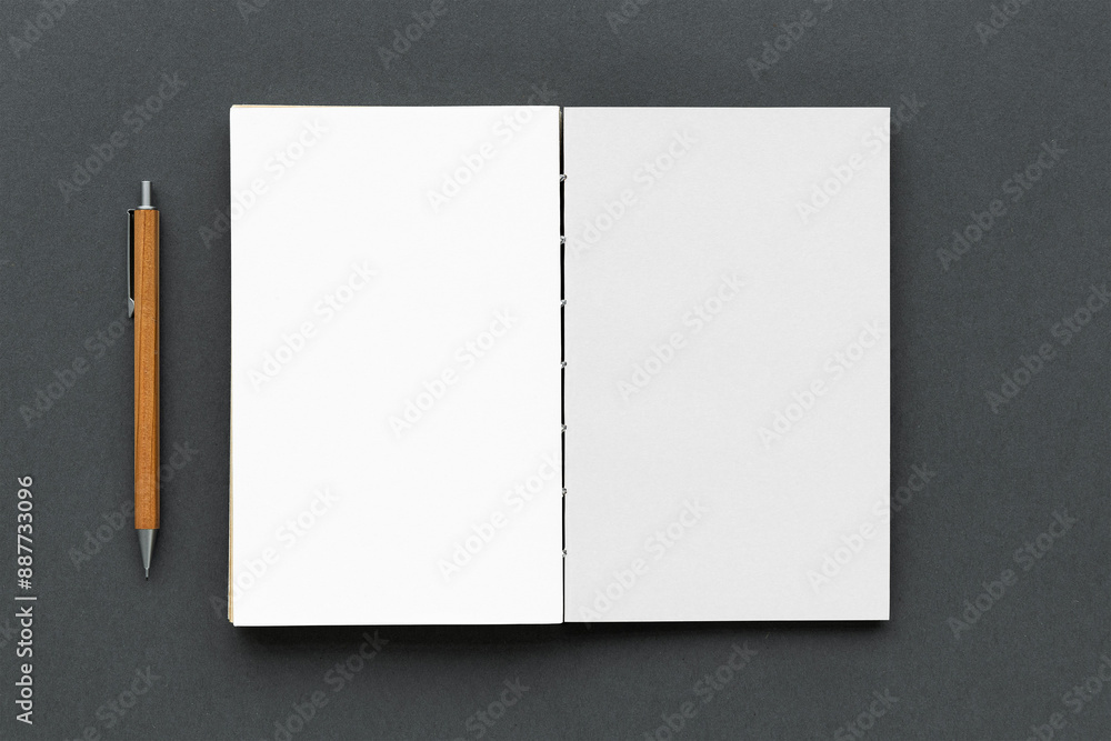 Poster opened notebook page with a pencil design element