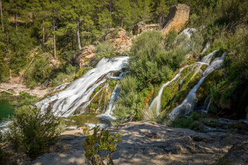 Salto de Poveda waterfall on the Tajo River as it passes through the Alto Tajo Natural Park in...