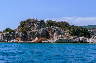 Obraz premium views of kekova island kas antalya turkey, sunken city, cliffs in the sea, simena archaeological sites