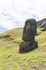 Moai heads on the slope of Rano Raraku on Easter Island (Rapa Nui),  Chile. Raraku is commonly...