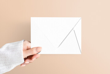 Fototapeta premium Envelope png stationery mockup with hand holding