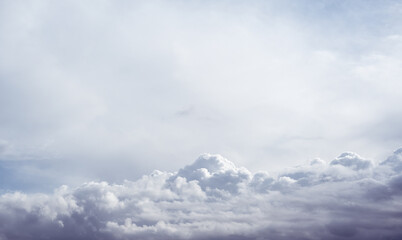 Fototapeta premium Dramatic blue sky with white clouds.