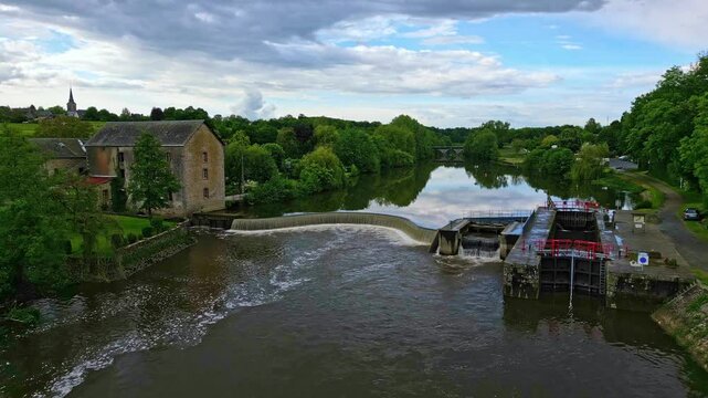 Saint-Baudelle lock or weir, Mayenne River, France. Aerial forward
