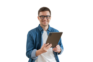 A positive male manager uses a tablet and a laptop. cut out
