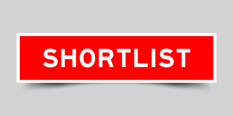 Square sticker label with word shortlist in red color on gray background
